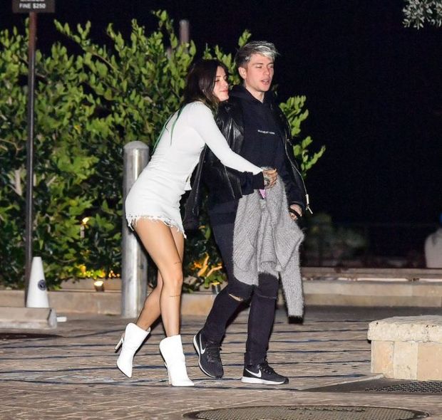 Bella Thorne making out with her boyfriend after dinner and has a nip slip wardrobe malfunction with her braless big boobs seen by paparazzi