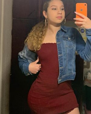 Latina teen nipping in dress