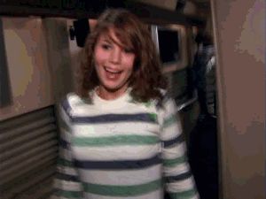 Funloving Curly-Haired Teen Flashes Tits For The Camera