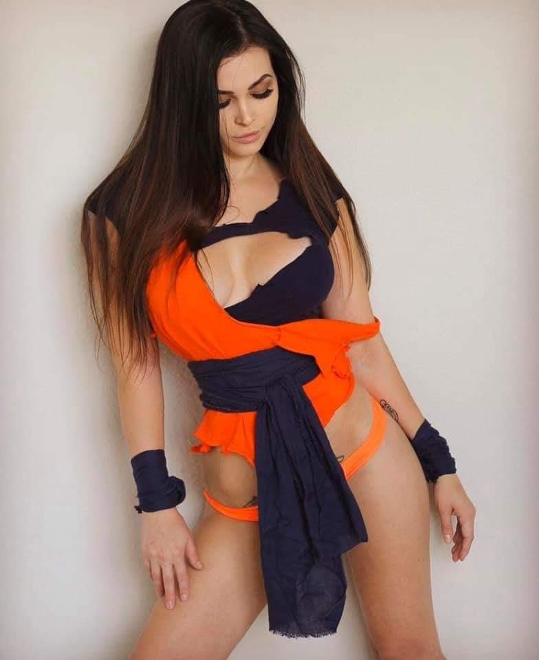 female goku posing in reflection