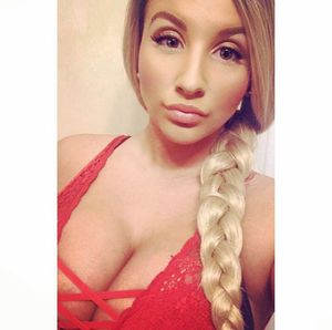 Busty blonde in lace top