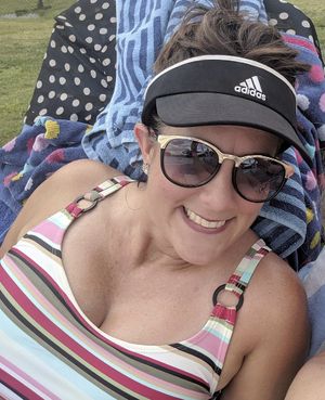 MILF in swimsuit with nice tits