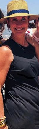 Thick MILF in dress with bra showing through it