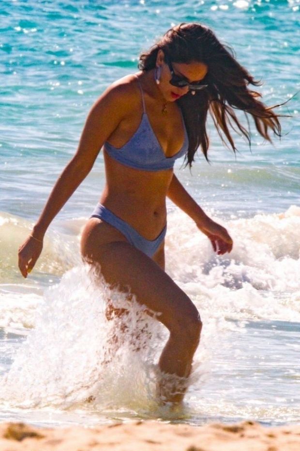 Eiza Gonzalez in a sexy blue bikini in the water and on the beach making out with her boyfriend seen by paparazzi showing nice cleavage with