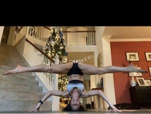 Sexy yoga babe with Christmas tree
