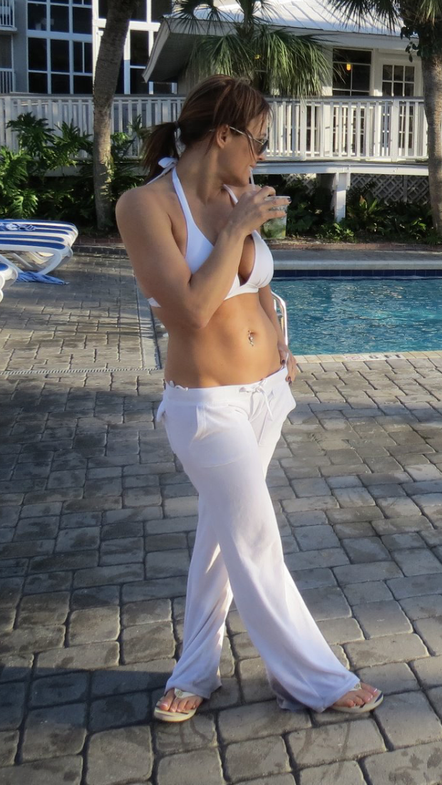 Poolside MILF Shows Just Enough to Tempt Me