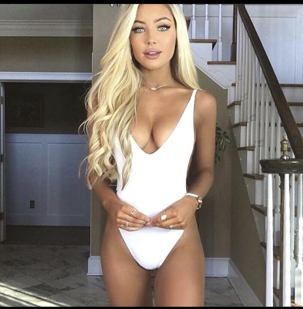 Hot blonde teen in white one piece swimsuit
