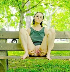 Spreading Her Pussy On The Park Bench