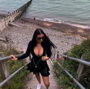 Busty brunette gets her tits out