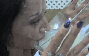 Drinking cum from a bowl