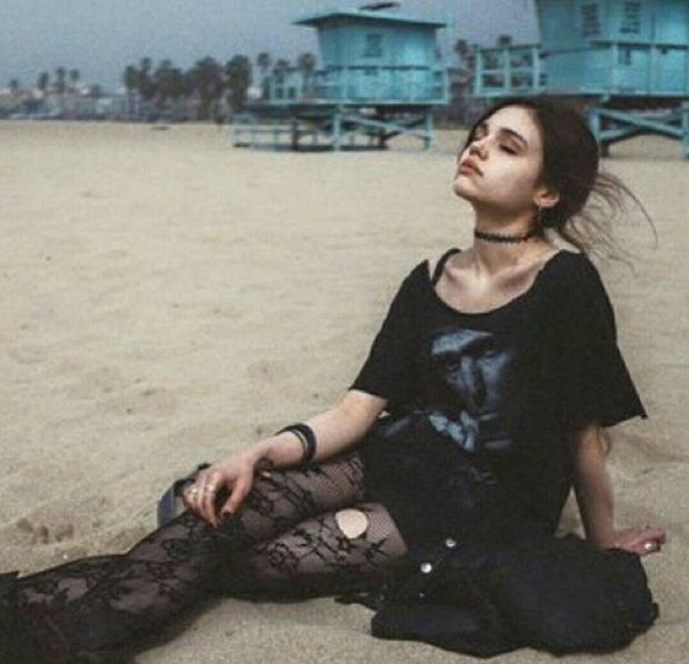 Skinny alt teen on beach