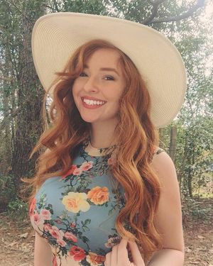 sunny redhead big boobs