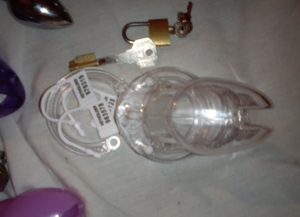 The clear chastity cage is so that everybody can see how pathetic and small your clitty is - so small that it doesn't even fill the cage up!
