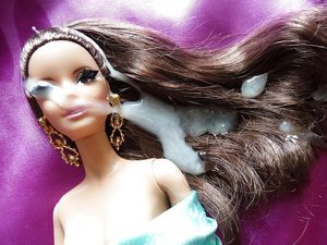 Cum on Barbie doll face and hair