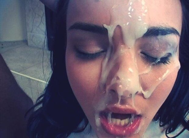 SickJunk fan shows off her face painted with cum.