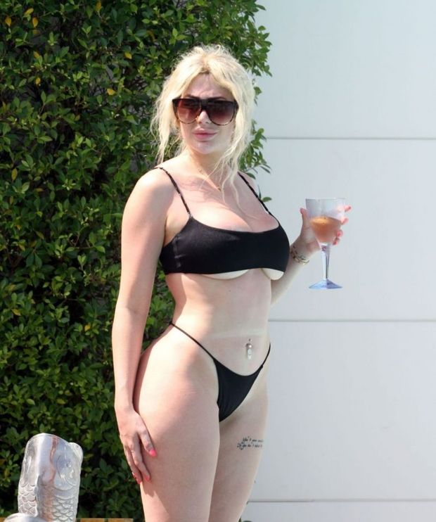 Chloe Ferry sexy ass booty in a thong bikini also showing nice underboob cleavage with her big tits seen by paparazzi.