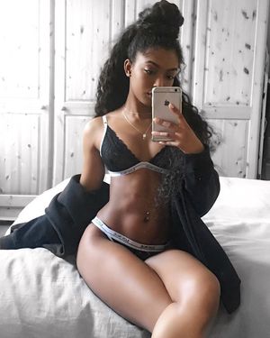 Beautiful black woman in bra and panties.