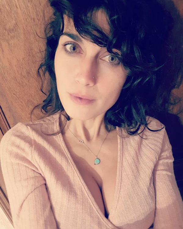sexy brunette artist Berengere Jullian cleavage