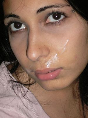 Cute babe with cum on face