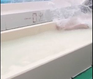 Sexy Chinese teen accidentally puts on a show for her fans at the water park.