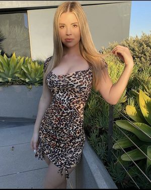 Hot blonde teen in cheetah printed dress