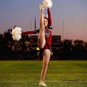 Cheerleader with legs wide open