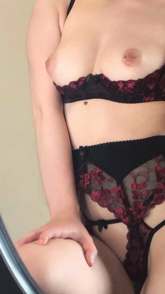 Open cup bra with piercings