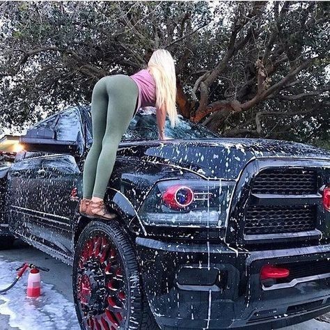 Bubble butt gal washing the truck