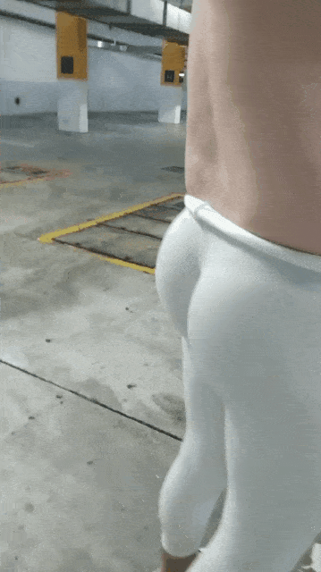 booty in white leggings with visible thong ass