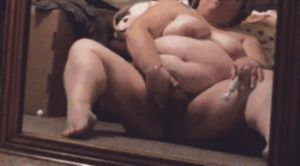 BBW legs spread rubbing her body in mirror