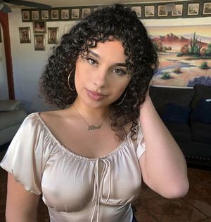 Gum drop Latina nipple poking through