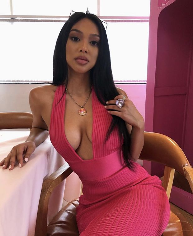 Hot looking in her pink dress