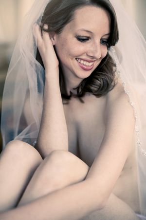 Sexy Bride doing a photoshoot for hubby