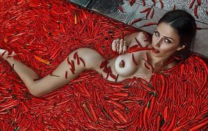 Red Hot and Naked in a bath of Chillies