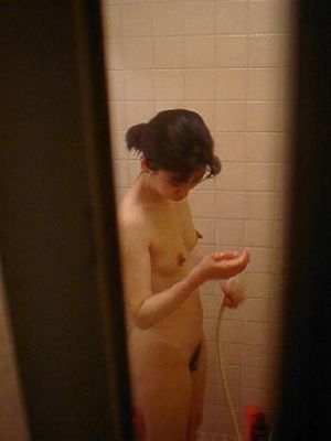 Peeping on an Asian woman in the shower