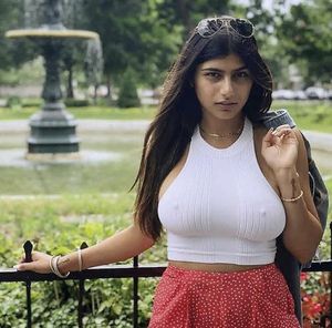 The beautiful big breasted Mia Khalifa glaring at you for creeping her out