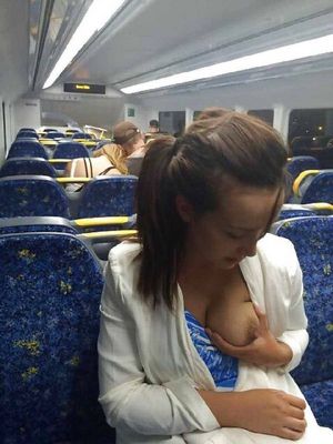 Squeezing and checking her boob on the train