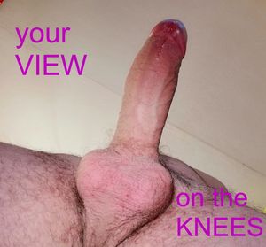 This is your view, COCKSUCKER! On the kness.