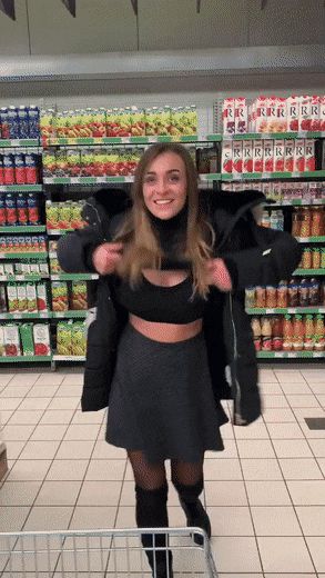 Cutie flashing her big boobs at the supermarket
