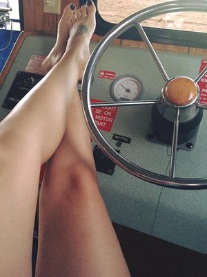 Sexy Tattoo Feet On Boat