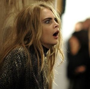 Either her orgasm face or shocked at what’s about to enter her mouth and pussy