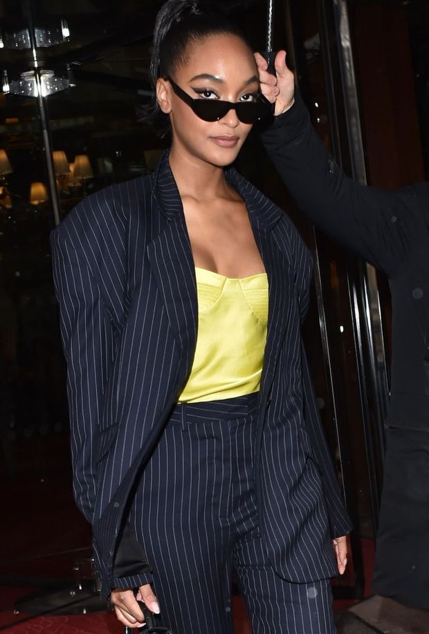 Jourdan Dunn areola peek nip slip wardrobe malfunction seen by paparazzi also showing nice cleavage with her big tits in Paris.