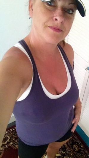 inviting smiling Hot MILF wants you to work out with her and give her your protein cum. 57c.