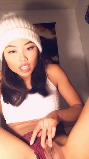 Asian babe getting ready for you