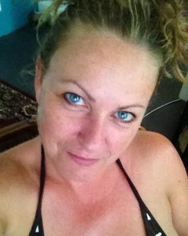 inviting smiling Hot MILF with intense blue eyes is waiting patiently for her turn to get creamed. 57e