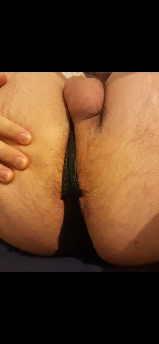 Virgin ass poking out from her thong