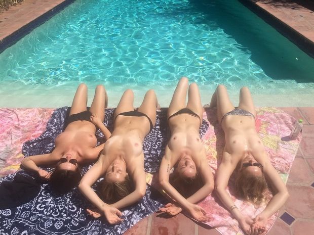 tanning by the swimmingpool