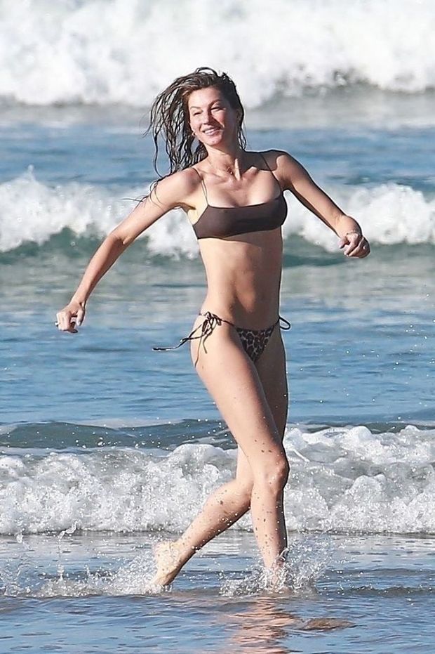 Gisele Bundchen sexy ass in thong bikini doing a photoshoot on the beach while in Costa Rica showing off her famous model body.