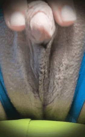 Teen plays with her large clit