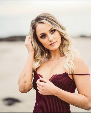 Hot blonde teen in red one piece lingerie